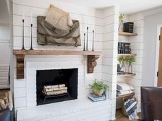 a living room filled with furniture and a fire place