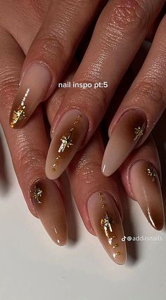 Discover 32 Fall Nails You Need to Try This Year! From chic Fall Gel Nails to Her Nails looks that will leave you obsessed, these Sophisticated Fall Nails are perfect for the season. Get inspired with Fall 24 Nails and Cute Nails For Fall that add a festive touch. Whether you're looking for Nail Inspo Thanksgiving or Classy Acrylic Nails, we’ve got the ultimate Nagel Inspo. Stay on top of the Nails Trends Fall 2024 with Classy Nail Colors Fall and Trending Nail Inspo 2024 for a flawless manic... Brown Gel Nails Almond, Brown Nails Ideas Aesthetic, Simple Nail With Gem, Brown Celestial Nails, Unique Nail Designs Fall, Minimalist Nails Almond Fall, Brown Y2k Nails Acrylic, Dark Red Nails With Gold Design, Gold Sticker Nails