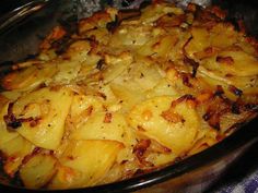 cooked potatoes in a crock pot on the stove