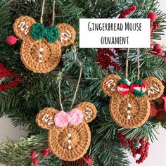 two crocheted ornaments hanging from a christmas tree with the words gingerbread mouse ornament