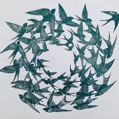 a drawing of birds flying in a circle