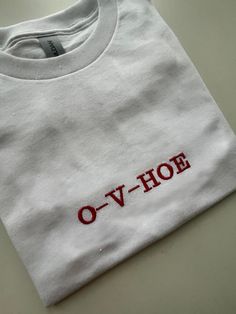 O-V-HOE Embroidered T-shirt, Monogram, Funny T-shirt, Unisex, SHIPPING INFO: FREE UK DELIVERY are sent as 1st Class (1-2 Working days) UK EXPRESS (Next day delivery) this is an extra cost at checkout Europe sent as International Tracked (Expected 3-5 working days) Worldwide sent as International Tracked (Expected 5-7 working days) EMBROIDERY THREAD: POLYESTER T-SHIRT: 100% COTTON (WHITE 170 GSM) (OTHER COLS 180 GSM) SWEATSHIRT: 80% COTTON, 20% POLYESTER (WHITE + HEATHER GREY 260 GSM) (OTHER COLO White Letter Embroidery T-shirt For Streetwear, Red Cotton T-shirt With Custom Embroidery, White Heather, Embroidered Tshirt, Funny T Shirt, Embroidery Thread, Funny T, Funny Tshirts, Heather Grey