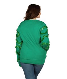 Just when you thought the ugly Christmas sweater couldn't get any crazier. Enter, the Women's Gaudy Garland plus size ugly Christmas cardigan. It's green. It's red. It's got christmas bulbs and tinsel. It's basically a Christmas tree. We're the pioneers of all things gaudy, and this one just about tops the list. Nobody will know where to look on White Elephant Day in the office, while your gal pals will be lining up to try it on. It's super comfy too, so this may be the season of giving but you' Tipsy Elves, Christmas Cardigan, Urban Sophistication, Chic Sweater, Christmas Outfits Women, Christmas Outfits, Chic Sweaters, Muted Tones, Gal Pal