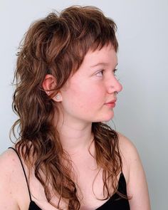 Wavy Mullet Shag with Baby Bangs Mullet For Wavy Hair, Shag With Baby Bangs, Shullet Hairstyles, Wavy Mullet, Long Hair Shaved Sides, Mullet Shag, Shaggy Mullet, Very Short Bangs, Mullet Hairstyles