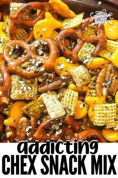 there are many different types of snacks in the bowl together, including pretzels and chex snack mix