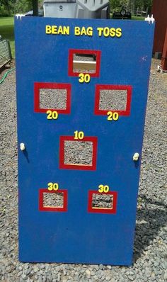 the bean bag toss machine is blue and red