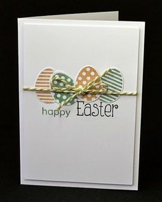 an easter card with polka dot eggs tied to it