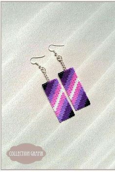 the earrings are made with purple and pink strips