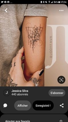 a person with a tattoo on their arm and the words jesus si sabonner