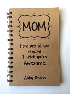 a notebook with the words mom on it and an image of a handwritten note