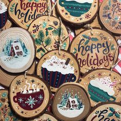 wooden christmas ornaments are displayed on a table