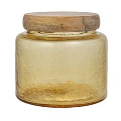 a glass jar with a wooden lid on a white background