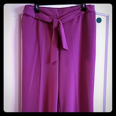 Lavender Flowy Wide Leg Pants With High Waist And Tor Belt. Flat Front, Modern Fit, Pull On, Side Slip Pockets, 96% Polyester/4% Spandex, Unlined, 32 In Inseam, Machine Wash Stretch Ankle-length Purple Pants, Casual Purple Ankle-length Wide Leg Pants, Purple Ankle-length Wide Leg Pants, Purple Stretch Ankle-length Pants, Chic Purple Ankle-length Bottoms, Elegant Long Purple Pants, Elegant Purple Long Pants, Purple Summer Wide Leg Work Pants, Spring Purple Wide Leg Pants For Work