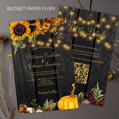 the wedding card is decorated with sunflowers and fall leaves, which are lit up by string lights