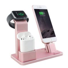 an iphone charging station with two airpods attached to it