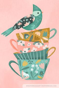 a bird sitting on top of stacked teacups in front of a pink background