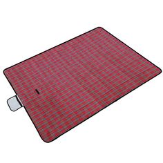 a red and black checkered rug on a white background