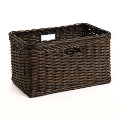 a brown wicker basket on a white background