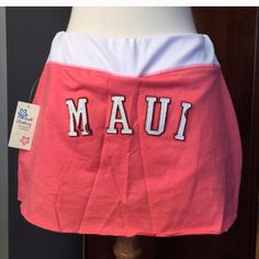 New Coral Mini Skort (Mini Skirt With Shorts) With Maui Across The Behind. Nwt. Drawstring For Adjustable Waist. Size Says Large But Fits Small. Casual Cheerleading Skort With Elastic Waistband, Summer Skirt With Built-in Shorts For Cheerleading, Sporty Cotton Bottoms With Lined Skirt, White Sporty Skort For Beach, White Sporty Skort For The Beach, Casual Summer Cheerleading Skort, Sporty Lined Cotton Skirt, Sporty White Skort For Beach, Skirted Bottoms For Summer Cheerleading