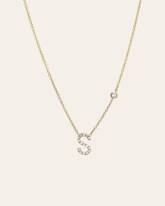 Beautifully handcrafted 14k gold pave diamond initial and a small bezel diamond on a dainty cable link chain necklace. Available in white, yellow and rose gold. This stunning piece will be you new favorite necklace! Wear it with your initial, or your loved one's. Size of Initial: Approx. 8mm Diamond Bezel Carat Weight: Approx. 0.03 ctw Diamond Clarity: VS Diamond Initial Carat Weight: Approx. 0.11 ctw Standard Production: 4-9 business days Rush Order Production: 2-5 business days Shipping: Selec Bezel Necklace Diamond, Favorite Necklace, Bezel Necklace, Vs Diamond, Link Chain Necklace, Bezel Diamond, Necklace Sizes, Chain Link Necklace, Diamond Clarity