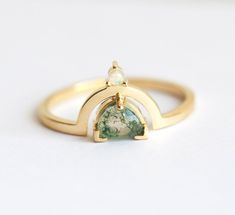 Green moss agate engagement ring with a half-moon-cut mossy gemstone and an Australian opal. Dainty crescent-shaped agate and opal healing ring. We are the original jewelry designers to use moss agate and create geometric moss agate one of a kind jewelry. Please beware of other jewelry designers using moss agate as their designs are replicas of our bestsellers and cannot match our high standards of production and authentication of quality. All moss agates are natural and hand-cut, which can resu Modern Gold Ring, Green Engagement Rings, Crescent Ring, Australian Opal Ring, Ring Man, Green Moss Agate, Agate Engagement Ring, Green Stone Rings, Moss Agate Ring