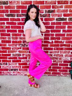 Elevate your outfit game with these satin high-rise pants in a bold solid hue. Featuring a zip fly and seamed details, these wide leg beauties will take your style to the next level. True to size fit! Small: 2/4 Medium: 4/6 Large: 8/10 Disclaimers; Our product colors may vary due to lighting and screen resolutions. Pink Stretch Satin Bottoms, Spring Pink Satin Bottoms, Bold High-waisted Pants For Spring, Casual High Waist Satin Bottoms, Chic Pink Satin Bottoms, High Waist Satin Pants In Casual Style, Casual High Waist Satin Pants, Spring Stretch Satin Bottoms, Bold Straight Pants For Spring