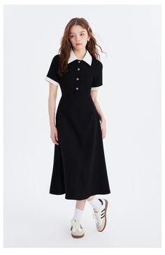 A casual polo dress with a distinctive contrast between black and white. The golden buttons decorated on the chest make it stand out. The waist is high, giving you a beautiful silhouette. A casual item that adds a touch of elegance. 
 
 
 
 
 
 
 
 
 
 
 
 
 
 
 
 
 
 
 
 
 
 
 
 
 
 
 
 
 
 
 
 
 
 
 
 
 
 
 
 
 
 
 
 
 
 
 
 
 
 
 
 
 
 
 
 
 
 
 
 
 
 
 
 
 
 
 
 
 
 
 
 
 
 
 
 
 
 
 
 
 
 
 Size 
 
 S size 
 
 
 Length: 120cm 
 Bust: 84cm 
 Waist: 68cm 
 Sleeve length: 25cm 
 
 M size 
 
 L Classic Black Midi Dress With Button Closure, Classic Collared Midi Dress, Classic Black Dress With Collared Neckline, Belle Silhouette, Vestido Casual, Polo Dress, Xl Dress, Casual Dresses For Women, The Golden