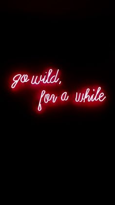 a neon sign that says go wild, for a while