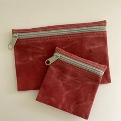 "Waxed canvas zip pouches in a set of two. Larger measures 4.5\" x 7\" (21.5cm x 17.75cm). It fits a large iPhone 7. Sturdy zipper. Smaller measures 4\" x 4\" (10cm x 10cm). Use as a wallet, for purse organization, makeup, just about anything. VEGAN! Zipper is Tan on Olive, Tan and Dk. Brown, Black on Charcoal, Grey on Yellow and Red" Canvas Makeup Bag, Waxed Canvas Bag, Canvas Purse, Canvas Pouch, Purse Organization, Zipped Bag, Zip Wallet, Waxed Canvas, Zip Pouch