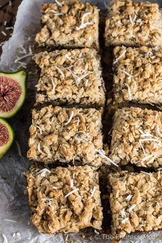 granola bars cut into squares on top of paper