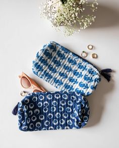 Our Fabric cosmetic pouch make for perfect gifts as well as utility items! Pick these as wedding favors or travel essentials or storing stationary. They are fairly spacious and come with lining and matching zip. They are lined with cotton shell and give a quilted look. Size: 11*6.5*5 inch 100% cotton zipper included Handmade Blue Cosmetic Bag For Gift, Eco-friendly Rectangular Cosmetic Bag For Gift, Eco-friendly Rectangular Cosmetic Bag Gift, Bohemian Rectangular Cosmetic Bag Gift, Travel Cases, Utility Bag, Toiletry Kit, Vanity Case, Cosmetic Pouch