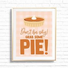 a framed poster with the words don't be shy grab some pie on it