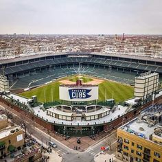 an aerial view of a baseball stadium in the city