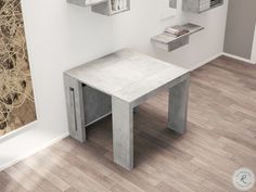 a white table sitting on top of a hard wood floor