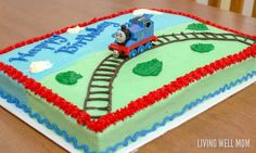 a thomas the train birthday cake on a table