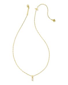 Refined, timeless, and with just a touch of shine—there are so many reasons to love the Phoebe Gold Short Pendant Necklace in White Crystal. Pairing a single baguette crystal with a dainty chain, this necklace has an undeniable elegance that’ll stun at any occasion. Metal 14k Yellow Gold Over Brass Material White Crystal Closure Lobster Clasp W/ Single Adjustable Slider Bead Size 19" Chain, 0.33"L X 0.13"W PendantDue to the one-of-a-kind nature of the medium, exact colors and patterns may vary s Layering Kendra Scott Necklaces, Dainty Jewelry Layered, Small Pendant Necklace, Short Pendant Necklace, Pendant Necklace Simple, Gold Shorts, Kendra Scott Necklace, Bar Jewelry, Greek Jewelry