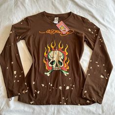 Y2k Vintage Ed Hardy Long Sleeve Shirt Most Iconic Y2k Tattoo Styled Images By Ed Hardy On This Ribbed Shirt Labeled Size Large Fit Medium As Well Pit To Pit 17”In Sleeve 23.5”In Length 25”In Y2k Style Brown Top For Fall, Brown Y2k Long Sleeve Tops, Y2k Fall Streetwear Tops, Y2k Streetwear Tops For Fall, Y2k Style Fall Streetwear Tops, Fitted Long Sleeve T-shirt With 90s Style, Brown Long Sleeve Top With Graphic Print, Y2k Long Sleeve Tops For Fall, Y2k Fitted Graphic Print Shirt