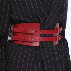 Made from smooth italian leather, the Maia Corset Belt is a timeless piece that will complete any outfit in style. With a generous front width, the belt tapers towards the back, creating a shape that flatter the waist.  Featuring 4 buckles at the front, this elegant piece can be easily paired with a dress or blazer. Handcrafted in EU using Italian Full Grain Leather and Nickel Plated Hardware        It is recommended to clean the products after each wear as follows:  The leather parts should be wiped with a soft cloth, slightly damp, and let dry at room temperature the metallic elements should be well wiped with a dry cloth  It is NOT recommended to expose the products to heat sources, humidity, water, solutions containing alcohol, fire      Avoid contact with rough or hot surfaces that ca Peplum Belt, 12 Dimensions, Leather Corset Belt, Water Solutions, Women Motivation, Corset Belt, August Birthstone Jewelry, Leather Corset, Gifts For New Mums