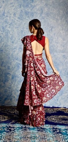 Maroon Georgette printed Ruffle Pre stitched saree with Plunge Neck Silk Blouse and Hand Embroidered Belt Floral Print Georgette Pre-draped Saree, Floral Print Pre-draped Georgette Saree, Fitted Pre-draped Saree With Printed Motifs, Festive Floral Print Floor-length Saree, Festive Floor-length Floral Print Saree, Festive Floor-length Floral Saree, Bohemian Style Festive Pre-draped Saree With Floral Print, Fitted Pre-draped Saree With Printed Motifs In Georgette, Traditional Pre-draped Saree With Floral Print For Party