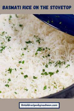 basmati rice on the stove top in a blue pan