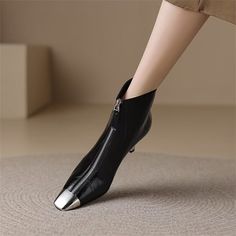 Step up your style game with these elegant high heel boots. Made from genuine cow leather, these ankle boots feature a pointed toe and a 6.5cm heel height for a sophisticated look. The sheepskin insole and pigskin/plush lining provide ultimate comfort, while the zip closure ensures easy wear. Elevate any outfit with these timeless and chic boots. Shop now and step into sophistication with these elegant high heel boots. Office Mid-calf Boots With Pointed Toe, Trendy Pointed Toe Heeled Boots For Office, Sleek Pointed Toe Heeled Boots For Winter, Sleek Winter Heeled Boots With Pointed Toe, Pointed Toe Boots With Metal Feet For Fall, Elegant Heeled Boots With Metal Feet For Fall, Elegant Winter Boots With Metal Feet, Office Mid-calf Boots With Sculpted Heel And Pointed Toe, Chic Boots