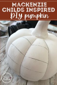 a white pumpkin sitting on top of a wooden table with the words, how to make a