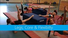 several children doing yoga exercises in a gym with the words legs, core & flexibility