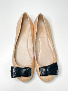 "Vintage Fendi ballet flats.  Flats are made from mostly leather with a woven like material on the outer portion of the shoe.  The shoe also has a black patten leather abstract bow on the front of each shoe. The bottom of the shoe has been resoled with a black anti-slip grip rubber material. There is minimal wear on the bottom of the shoe and no scrub marks on the exterior of the shoe. In perfect vintage condition. Both the bottom and the interior of the shoe reads: FENDi Made in Italy 36 MEASUR Vintage Fendi, Bow Shoes, Vintage Valentines, Rubber Material, Vintage Gifts, Luxury Shoes, Ballet Flats, Ballet Shoes, Vintage Ladies