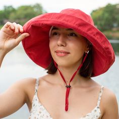 Extra Wide Brimmed Floppy Women's Adjustable Size to Fit All Heads Soft Brim Urban Boho Sun Hat Fall Spring All Seasons Crushable Packable Travel Elegant Vacation Honeymoon Ladies Hat Colors: Yellow , Pink , Black , Biege , Red  Removable adjustable matching color drawstring for windy days. This spring, summer, fall floppy hat has an extra wide 6 inch brim.  The brim can be turned up or turned down. It's easy to take shape you want due to bendable wire. It is an elegant accessory for women. It's Adjustable Wide Brim Red Sun Hat, Adjustable Red Wide Brim Sun Hat, Adjustable Hats With Uv Protection, Uv Protection Adjustable Hat, Brimmed Bucket Hat For Outdoor Activities, Red Wide Brim Bucket Hat For Outdoor, Red Adjustable Bucket Hat For Summer, Hats For Outdoor Activities With Short Brim, Red Brimmed Bucket Hat For Outdoor