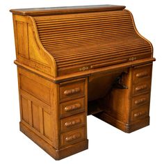 an old fashioned wooden desk with drawers