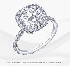 a cushion cut diamond ring in white gold