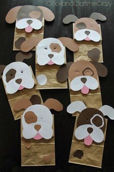 paper bags with dogs cut out of them