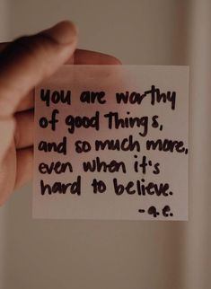 someone holding up a piece of paper with the words you are worthy of god thing s and so much more even when it's hard to believe