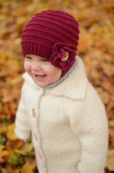 "This sweet toddler girl hat is handmade by me in 100% merino wool - very soft, luxuriously gentle next to the skin, warm and still stylish! This knit girl hat goes with a crocheted flower and together with decorative wooden button complete the pretty style. Merino wool is breathable and active fiber that reacts to changes in body temperature and discourages sweating. Enchanting when worn by your sweet girl, whether an infant or a youngster, this feminine design surely please your young lady. A Girls Beanie, Girls Winter Hats, Baby Hat Knitting Pattern, Girl Beanie, Baby Faces, Baby Hats Knitting